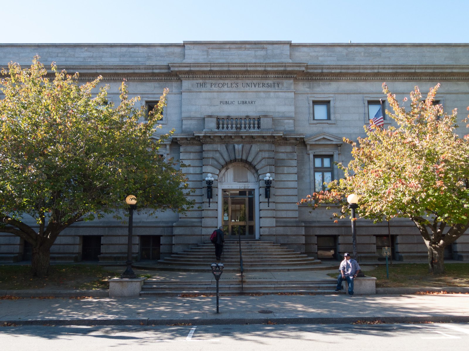 The Fall River Public Library's granite front on North Main Street, with "The People's University" carved above the entrance