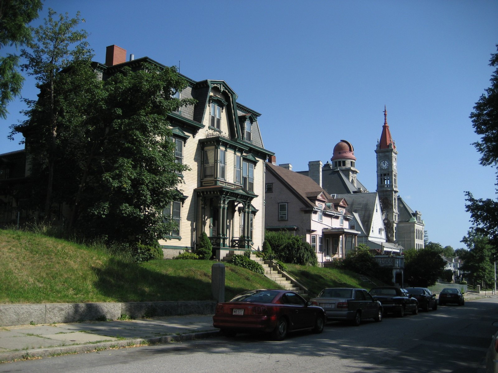 Houses on Rock Street in Fall River, with the B.M.C. Durfee school building beyond, photographed in June 2007