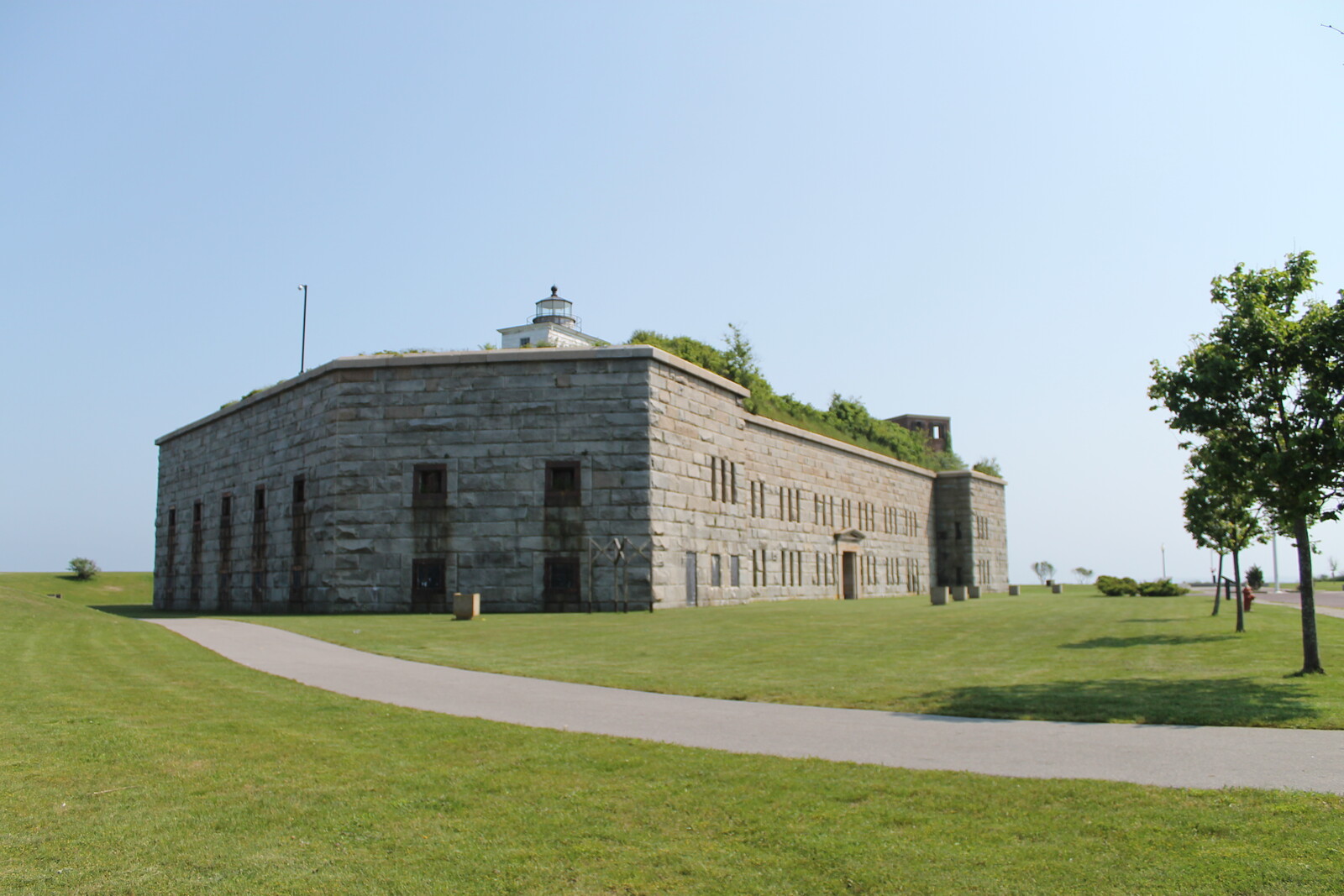 The stone fort and Clarks Point Lighthouse at Fort Taber in New Bedford