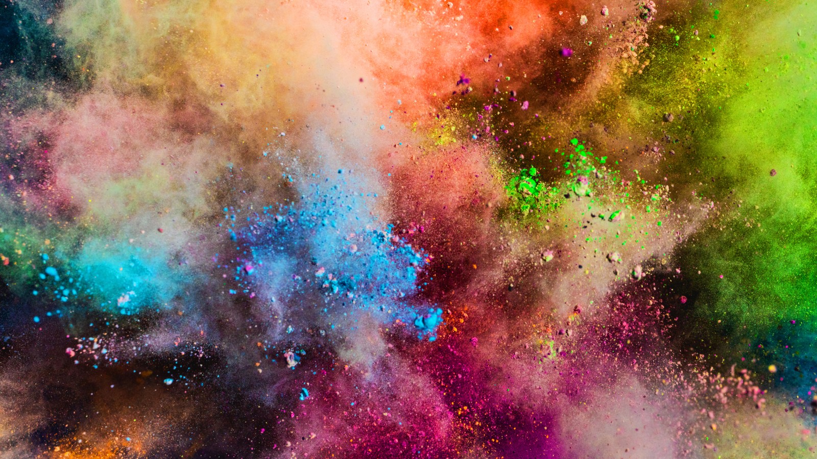 Colored powder bursting in the air, the kind thrown at color runs (stock image)