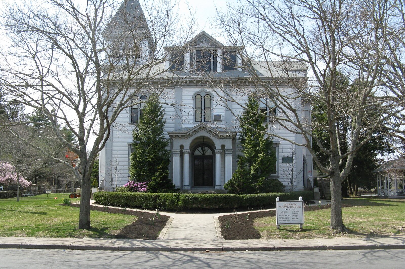 Marion Town House, a white Second Empire building behind bare trees