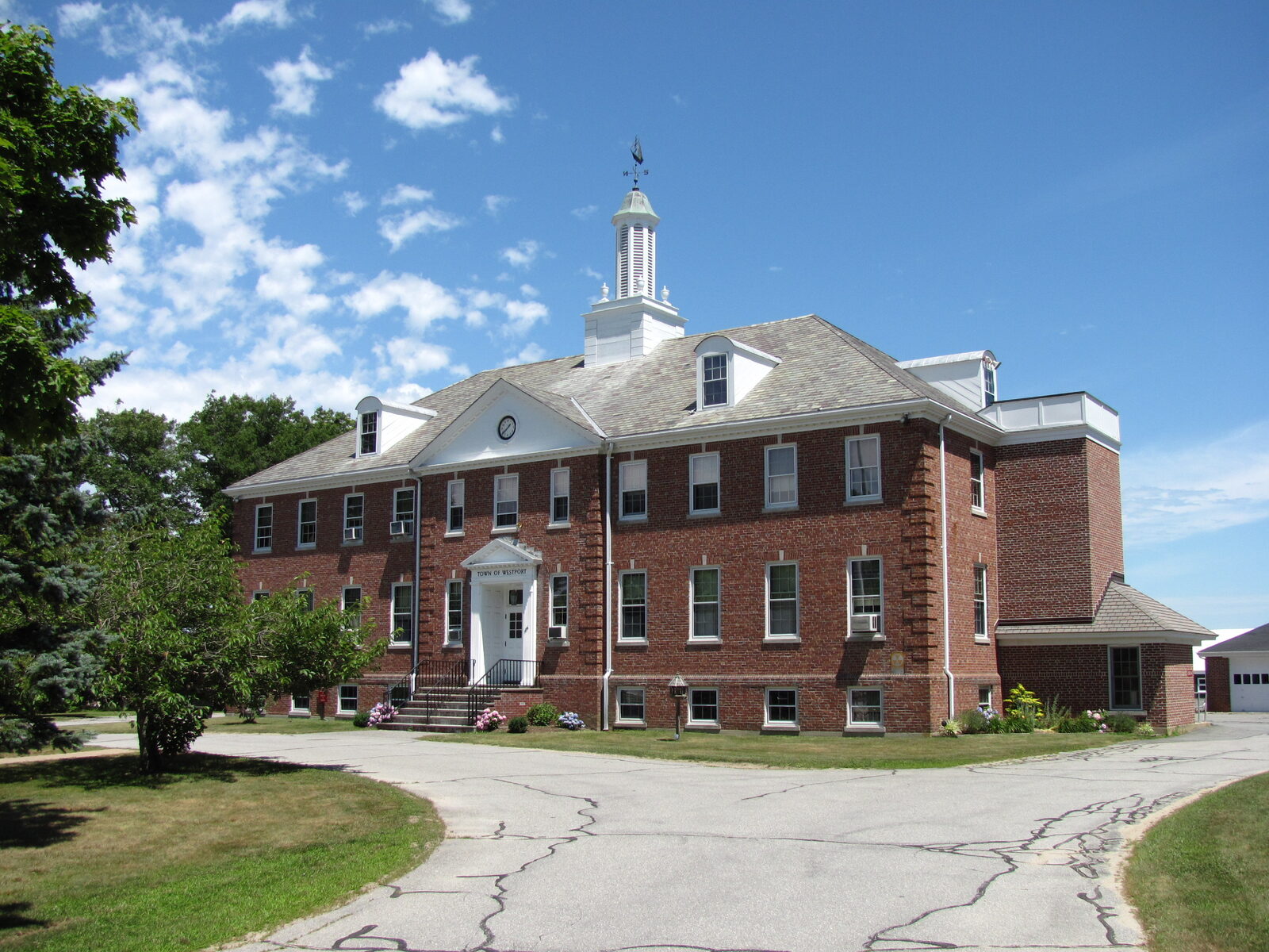 Westport Town Hall, a brick building with a white entrance and cupola
